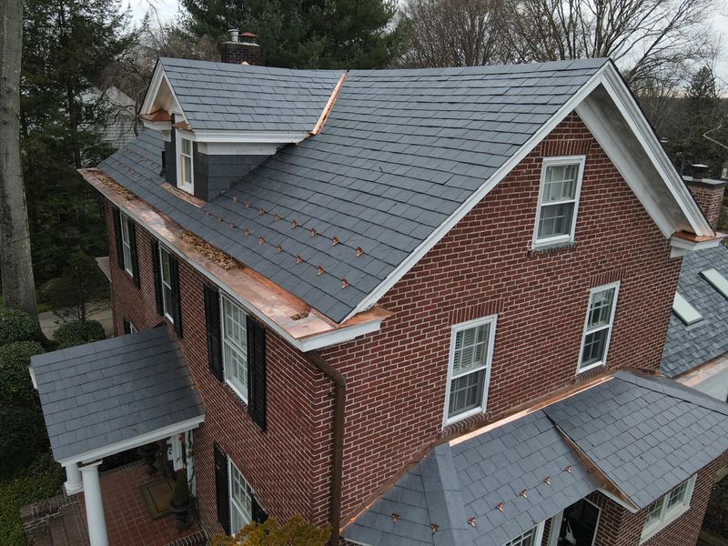 Slate Roofing And Copper Accents