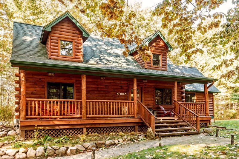 These 9 Woodsy Cabin Aesthetics From Michigan Retreats Will Inspire Your Exterior - Decor Hint Wraparound Porches That Embrace Forest Views