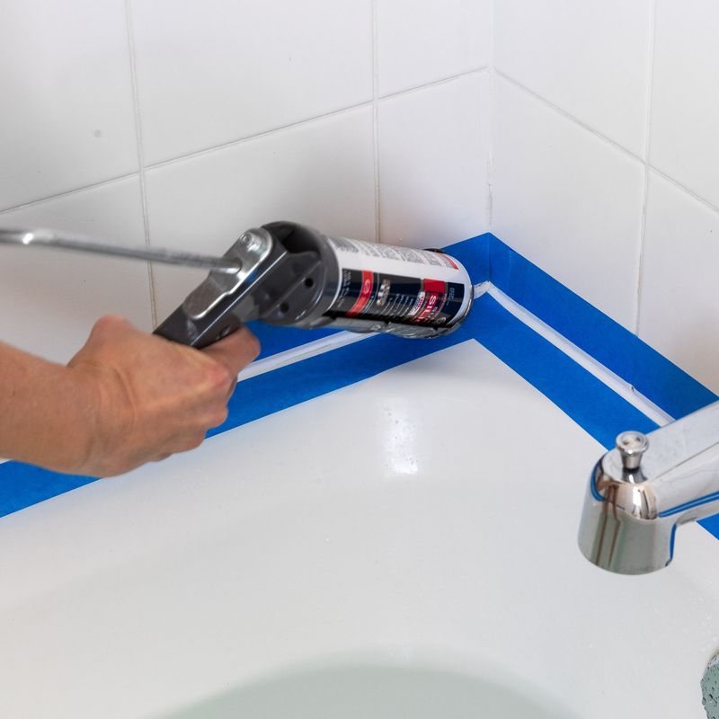 13 Cheap Fixes That Will Make Your House Feel Nicer - Decor Hint Add Fresh Caulk Around Sinks and Tubs