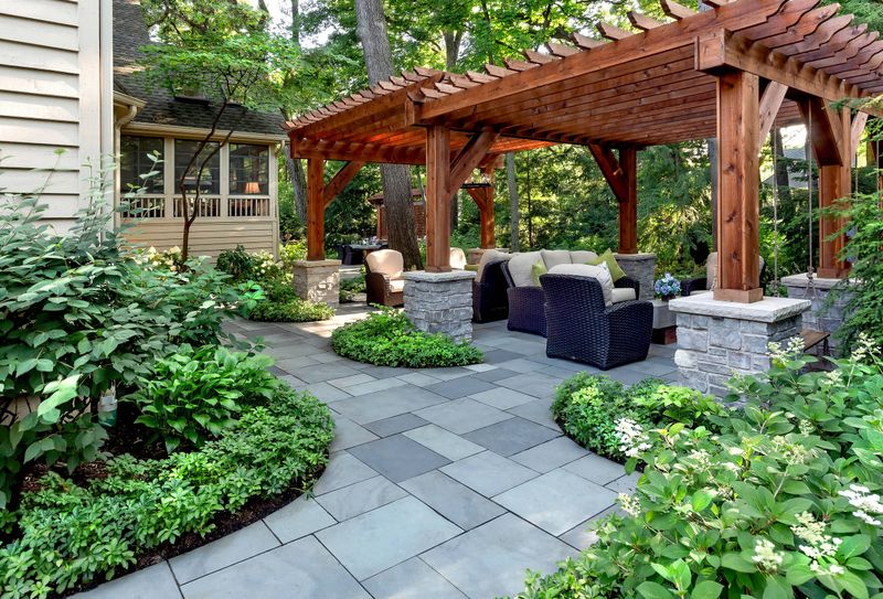 Charming Outdoor Features Seen In New Jersey Homes - Decor Hint Bluestone Patios Under Mature Oak Trees