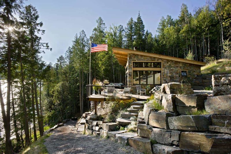 These 9 Woodsy Cabin Aesthetics From Michigan Retreats Will Inspire Your Exterior - Decor Hint Natural Stone Foundations That Anchor To The Land