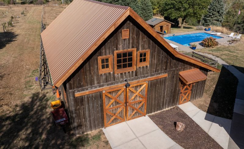 Smart And Stylish: 12 Exterior Design Ideas Seen Across Nebraska Homes - Decor Hint Rustic Barn Door Accents