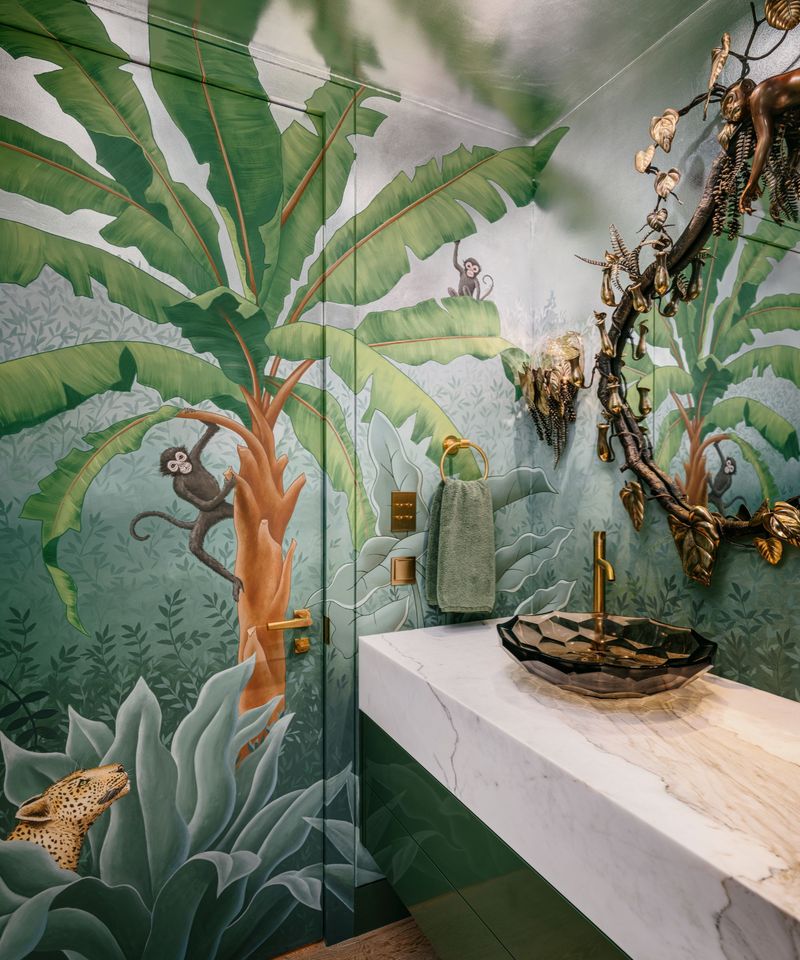 16 Ways How Designers Use Hidden Doors: The Whimsical Trend That Can Actually Be Very Practical - Decor Hint Murals or Wallpaper-Covered Doors