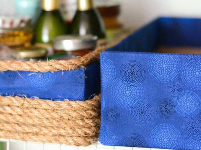 30 Smart Home Decorating Ideas That Cost Almost Nothing - Decor Hint Fabric-Covered Storage Boxes