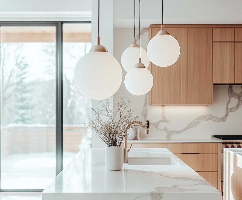 13 White Kitchens That Prove Minimalism Is Here To Stay - Decor Hint Modern Pendant Lighting Over Island