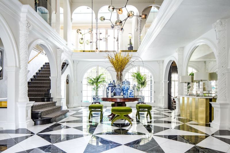 From Dated To Done 12 Miami Architecture Trends On The Way Out And 3 That Are History - Decor Hint Overbuilt Two-Story Entry Arches