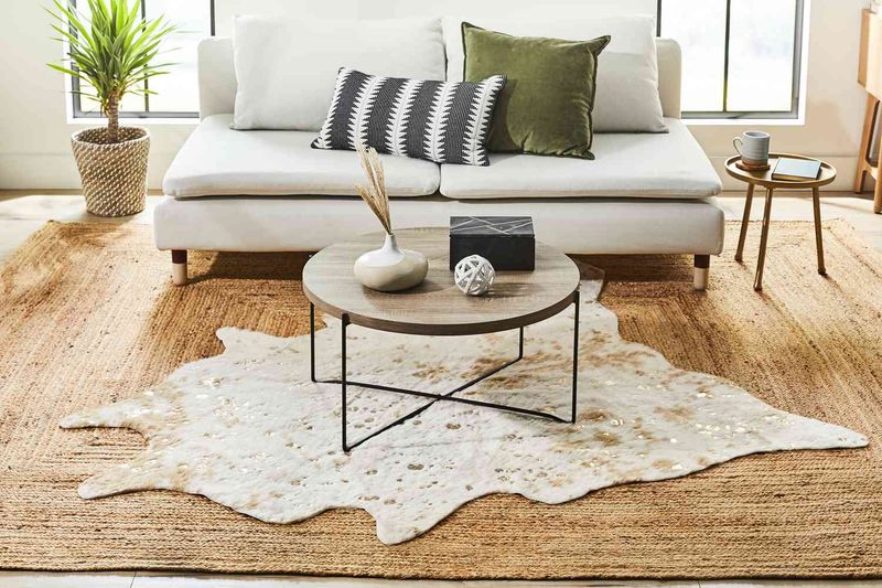 Make Your Small Living Room Shine 12 Styling Ideas For More Space And Style - Decor Hint Layer Rugs for Added Texture