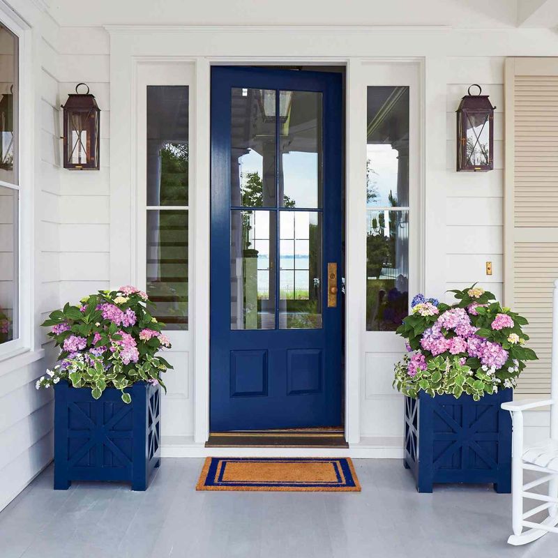 14 Entryway Ideas That Instantly Elevate Georgia Homes - Decor Hint Painted front door in deep sea-foam or navy blue