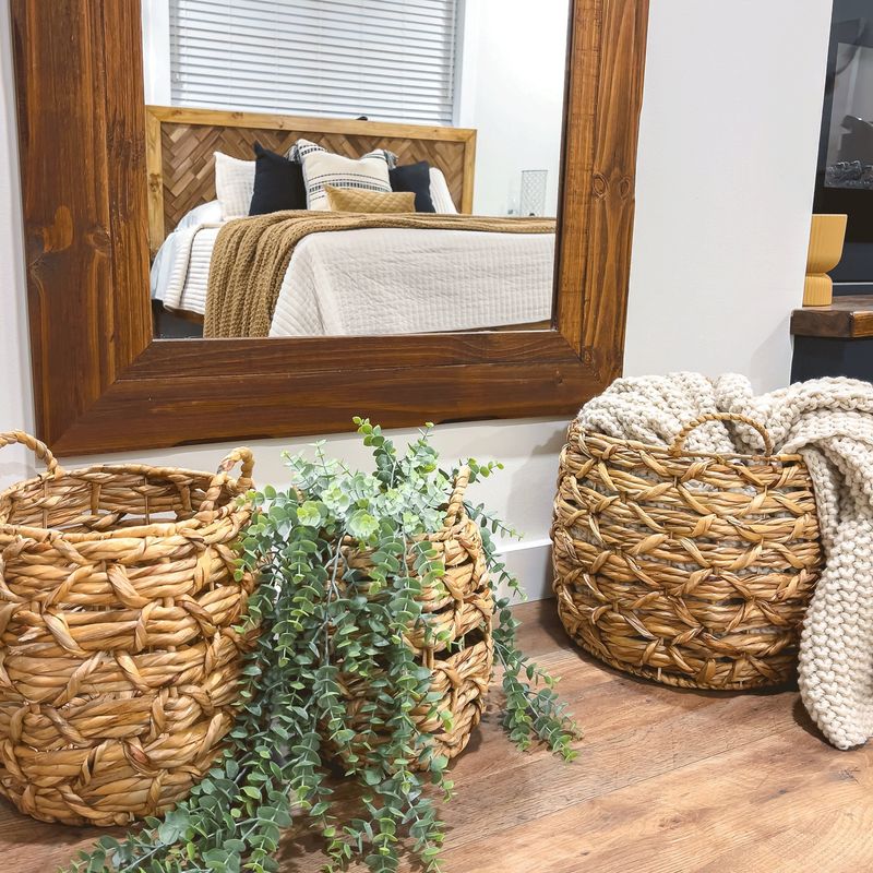 24 Inspiring Ways To Blend Rustic Boho And Farmhouse Styles In Your Living Room - Decor Hint Wicker baskets for storage