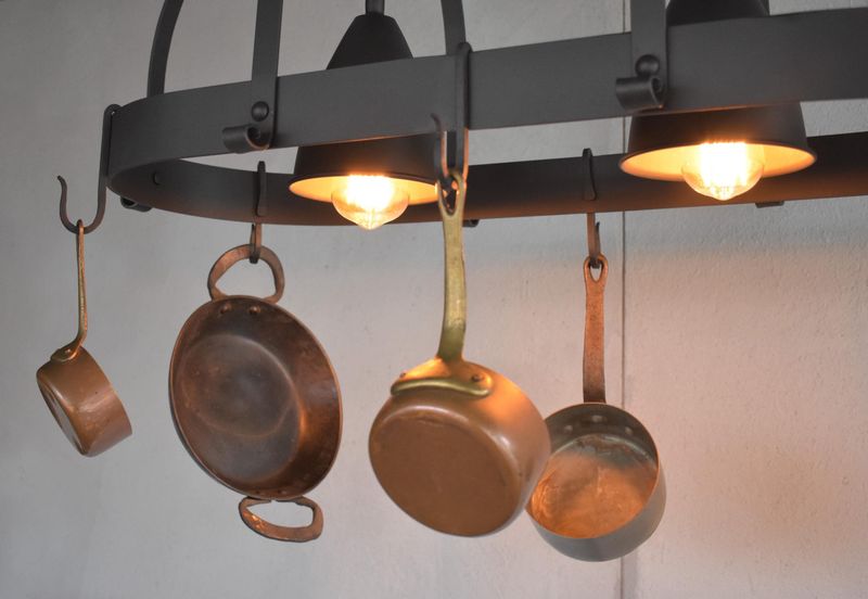 8 Kitchen Mistakes That Clash With New Mexico Style, And 10 That Feel Right At Home - Decor Hint Wrought Iron Or Copper Light Fixtures