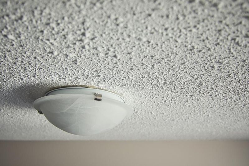 14 Outdated Home Features That Could Be Costing You Home Value In 2025 - Decor Hint Popcorn Ceilings: The Textured Nightmare