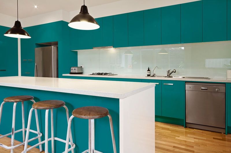 17 Blue Kitchen Cabinets That Display Elegance And Good Taste - Decor Hint Teal Glass-Front Cabinets