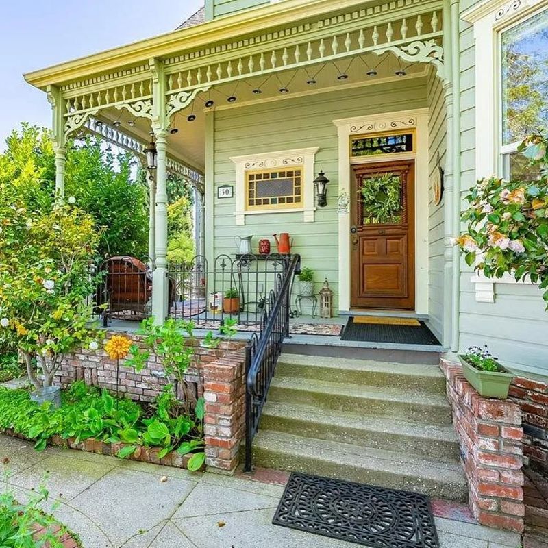 17 Must-See Photos Of An 1888 Queen Anne Home In Little Rock - Decor Hint Sunroom with Patterned Tile Floor