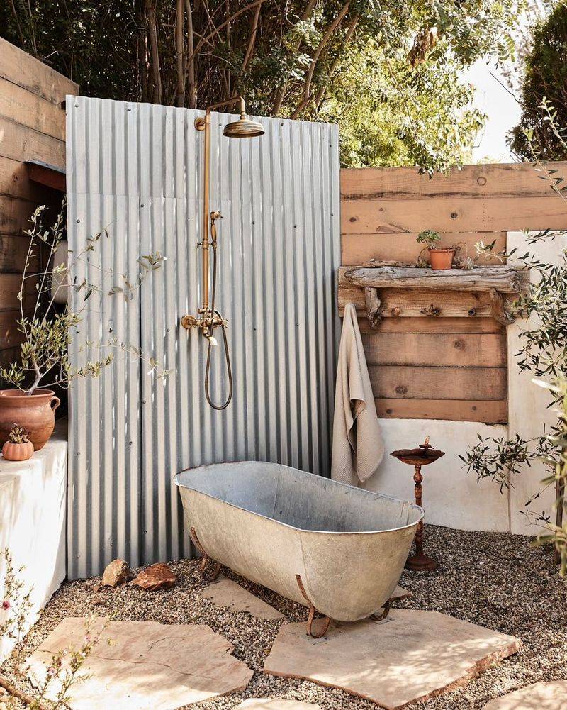 25 Outdoor Shower Ideas That Give Off BIG Beach House Energy - Decor Hint Vintage Brass Fixtures