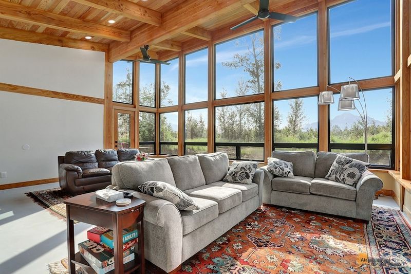 These 10 Rustic Decorating Trends Are Thriving In Alaska's Unique Homes - Decor Hint Panoramic Windows Framing Nature