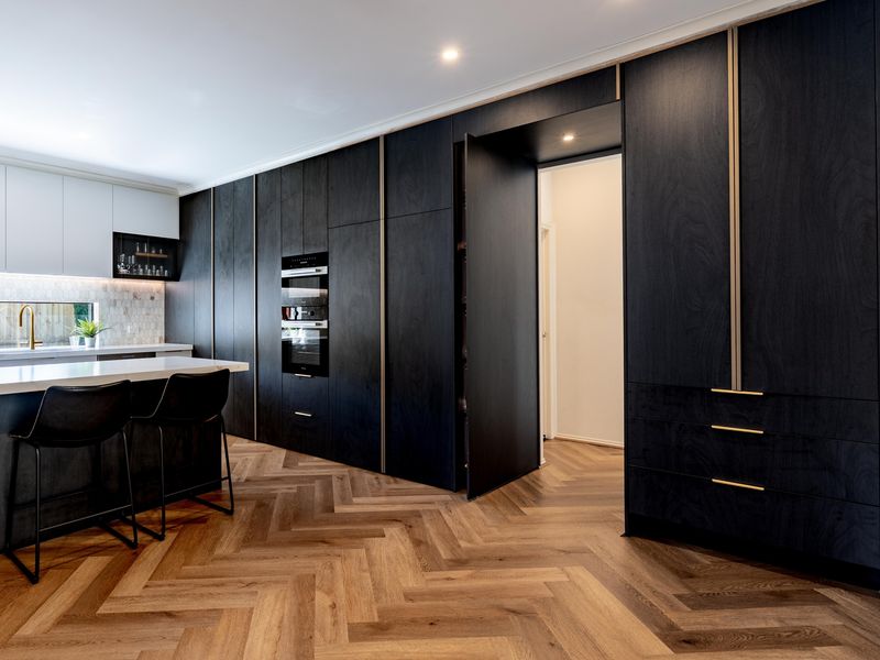 7 Small Room Decor Trends That Designers Say Will Be Forever Favorites In 2025 And Beyond - Decor Hint Hidden Storage Behind Beautiful Panels