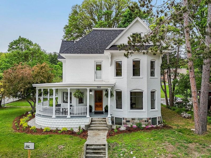 8 Curb Appeal Classics Michigan Homeowners Can't Stop Showing Off - Decor Hint Covered Porches Where Neighbors Actually Gather