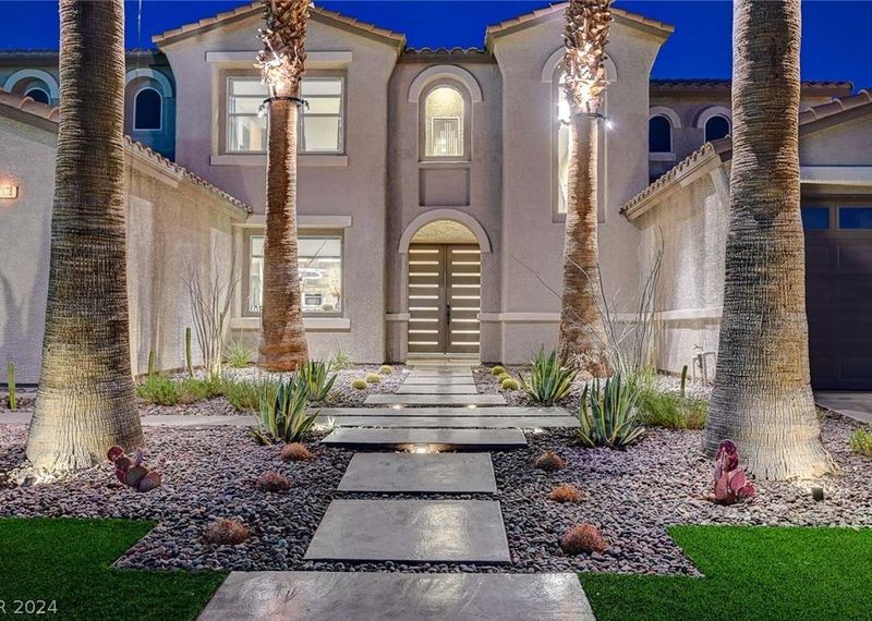 These 10 Las Vegas Homes Prove Coastal-Inspired Curb Appeal Can Work Anywhere - Decor Hint Brilliant Blue Accents Pop Against Desert Backdrop