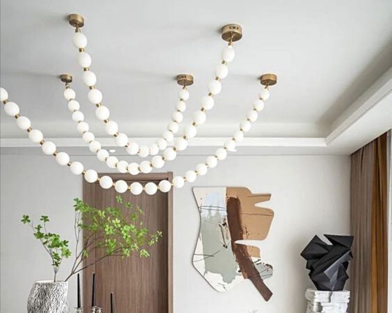 15 Things Your Home Needs ASAP, According To Interior Designers - Decor Hint Statement Lighting That Makes Rooms Sing