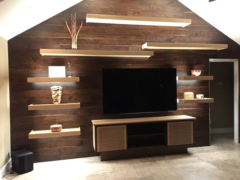22 Fancy Barndominium Homes That Beautifully Mix Rustic With Modern - Decor Hint Wood-Plank Feature Wall with Mounted TV