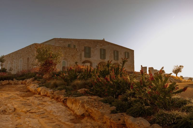 Whitewashed Stone And Traditional Façades