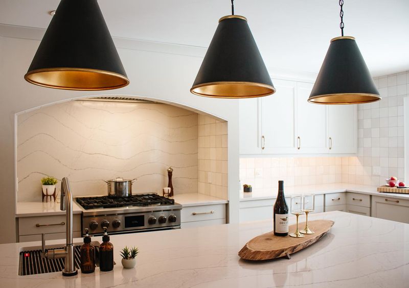 6 Kitchen Items That Bring Down Your Look And 6 That Instantly Upgrade It, According To Designers - Decor Hint Statement Pendant Lighting