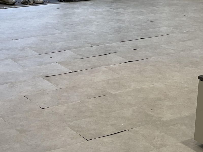 7 HGTV Renovation Hacks That Might Not Hold Up, And 5 Others To Think Twice About - Decor Hint Overuse Of Peel-And-Stick Flooring