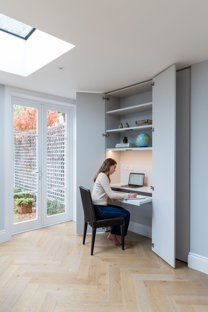 16 Ways How Designers Use Hidden Doors: The Whimsical Trend That Can Actually Be Very Practical - Decor Hint Secret Office Behind Built-Ins