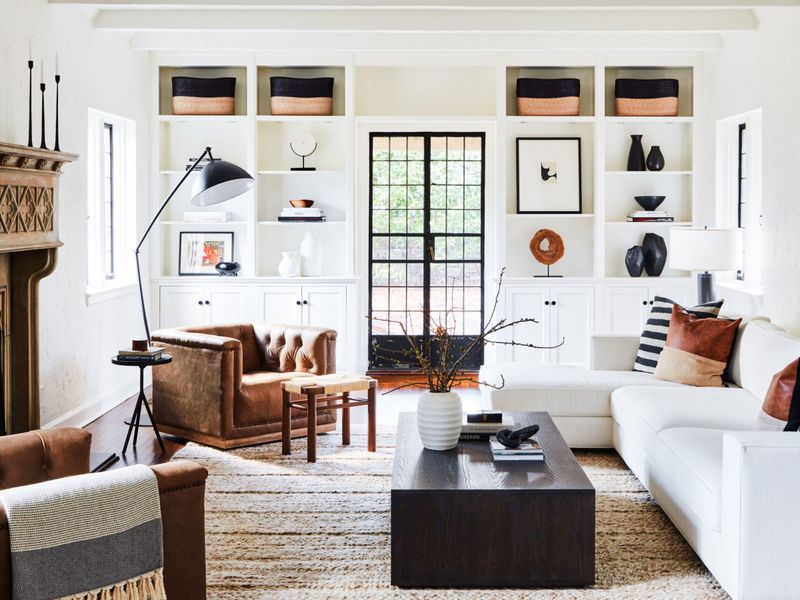 15 Tricks For Small Living Rooms That Interior Designers Swear By - Decor Hint Go Vertical with Storage