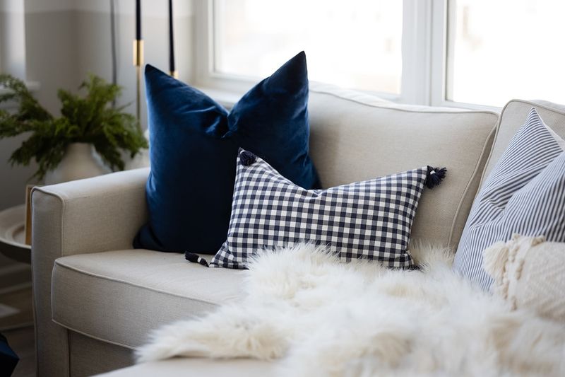 A Cozy Living Room Makeover - Decor Hint Textured Throw Blankets and Pillows