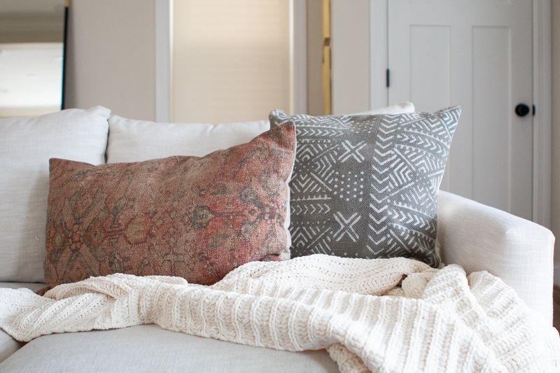 20 Common Mistakes That Make Your Home Look Tacky - And What To Do Instead - Decor Hint Keeping Old, Worn-Out Throw Pillows