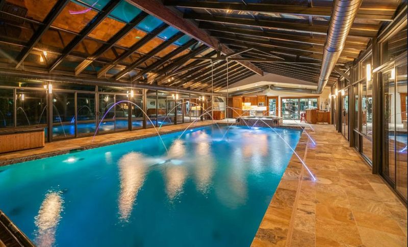 18 Photos That Show Inside A Mansion That Belonged To One Of America’s Wealthiest Families - Decor Hint Indoor Swimming Pool with Glass Ceiling