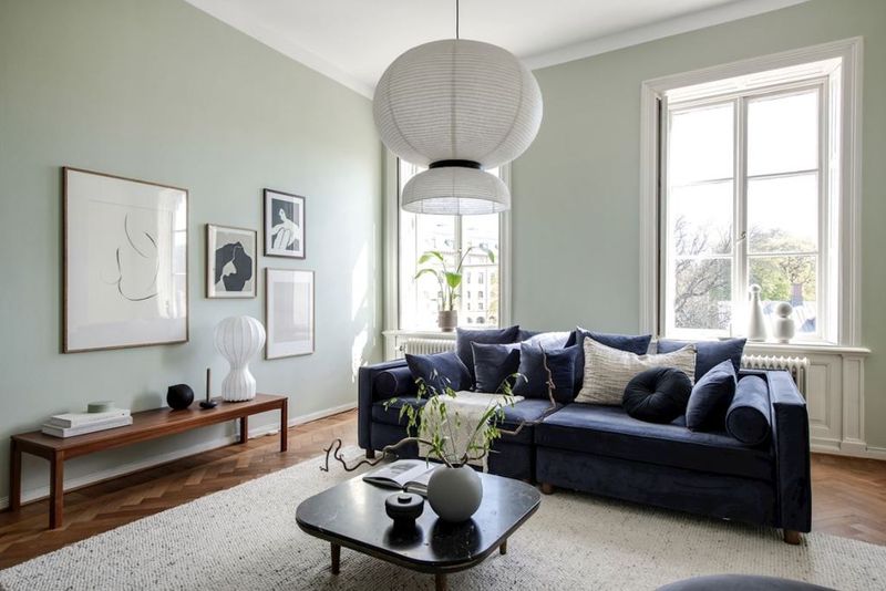 11 Interiors That Make A Case For The Blue & Green Color Combo - Decor Hint Velvet Blue Sofa + Sage Walls