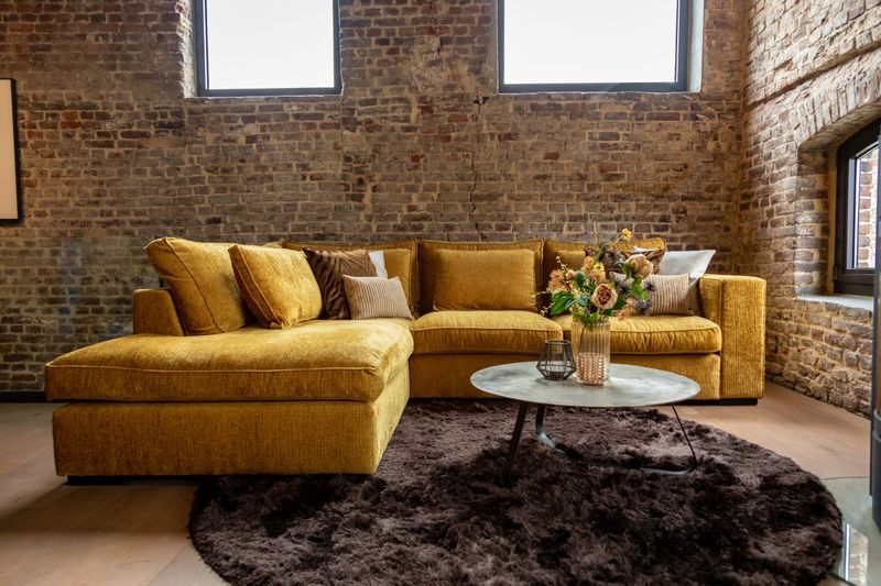 Forget Red, 'Unexpected Yellow' Is Stealing The Spotlight In Interior Design - Decor Hint Ochre Velvet Furniture Creates Luxury Statements