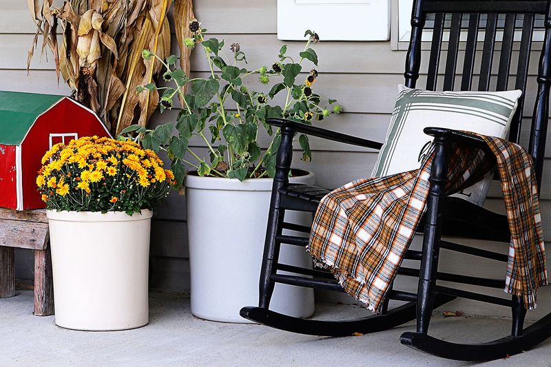 Charming Outdoor Corners That Give Georgia Homes Their Magic - Decor Hint Rocking Chairs with Plaid Cushions on Covered Porches