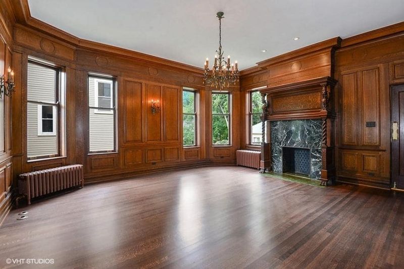 Library Offers Floor-To-Ceiling Bookshelves And Cozy Reading Nook