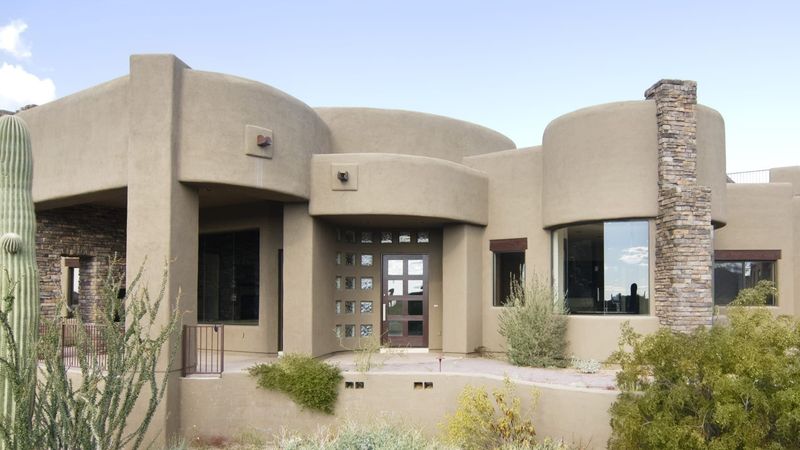Terracotta Or Earth-Tone Paint That Blends With The Desert