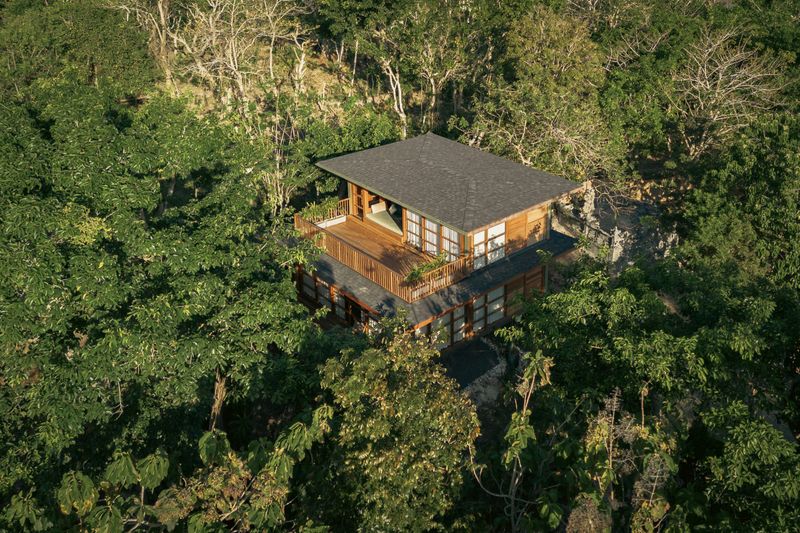 Architecture Meets The Wild: 11 Gorgeous Homes Crafted Within Natural Settings - Decor Hint Forest Treehouse Abode