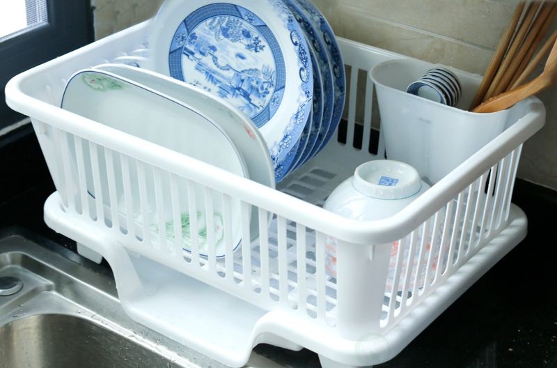 12 Decor Choices Designers Say Cheapen Georgia Kitchens, And How To Fix Them - Decor Hint Cheap, Disposable Dish Racks or Organizers