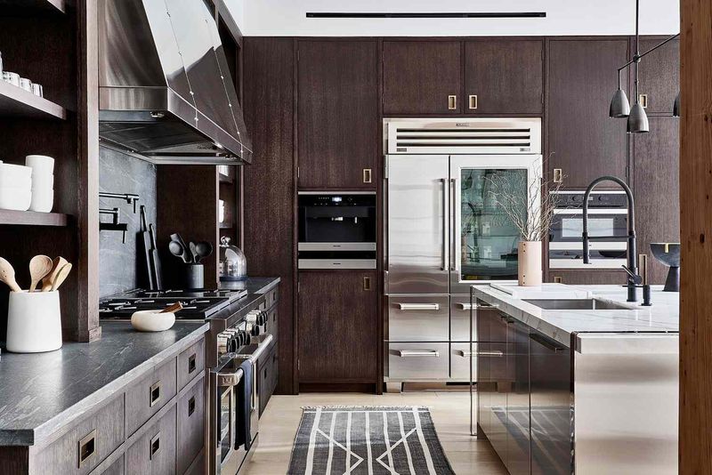 10 Earth-Toned Kitchens That Strike The Perfect Balance Between Modern & Timeless (Plus 10 That Are A Bad Choice) - Decor Hint Deep Chocolate Kitchens With Light Flooring