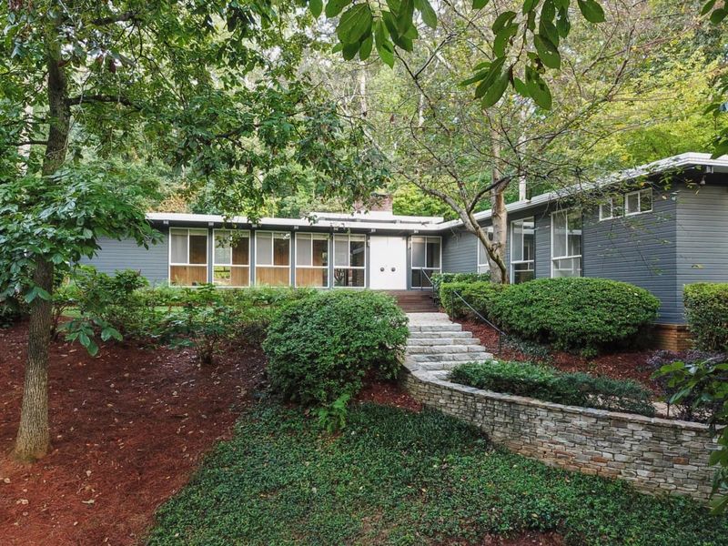 Tour This Iconic Mid-Century Marvel Hidden In The Hills Of Buckhead - Decor Hint Exterior Architecture Showcases Signature Butterfly Roof And Stone Façade