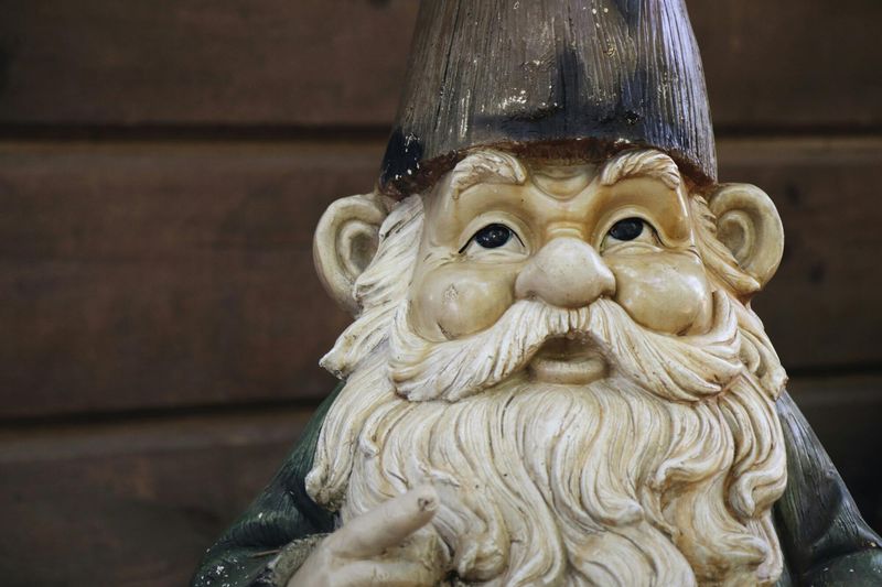 The Hidden Meaning Behind These 14 Outdoor Decorations - Decor Hint Gnome statues – Guardians of good luck and protection
