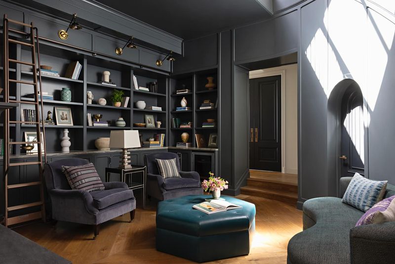 Wall-to-wall carpeting in dark shades