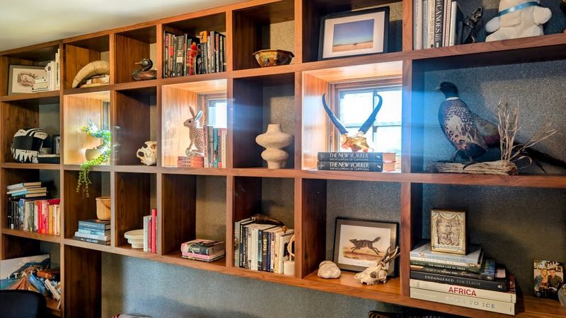 26 Living Room Design Tweaks That Feel Custom (But Aren't Pricey) - Decor Hint Add Vintage Books For Instant Character