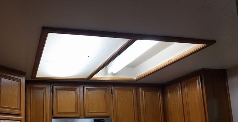 10 Kitchen Items That Drain Charm From Tennessee Homes (And 9 Stunning Upgrades Designers Swear By To Transform Your Space) - Decor Hint Fluorescent Lighting That Screams 'Office Break Room'