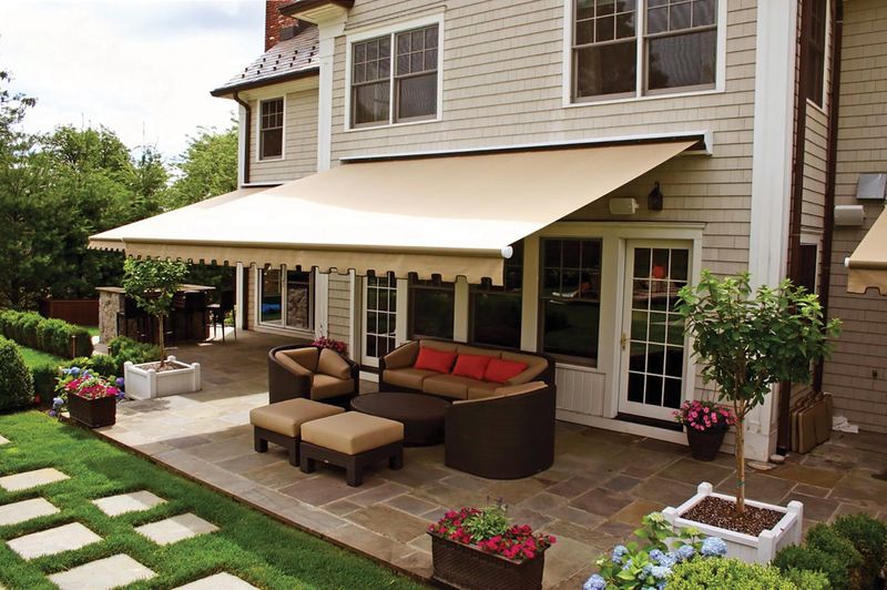 11 Weather-Smart Patio And Porch Ideas From Kansas Homes - Decor Hint Retractable Awnings for Instant Shade