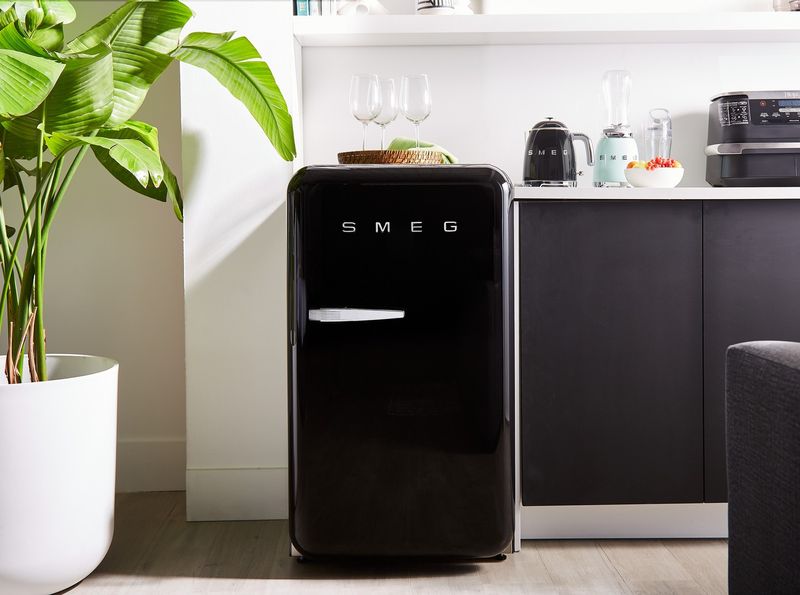 10 Outdated Furniture Colors We're Saying Goodbye To In 2025, According To Designers (And 10 That Are Trending Instead) - Decor Hint Black Furniture Is Fading To Background