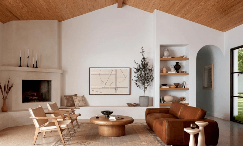 14 Mediterranean-Inspired Living Spaces That Bring A European Getaway Home - Decor Hint Living Room Featuring Warm Earthy Tones