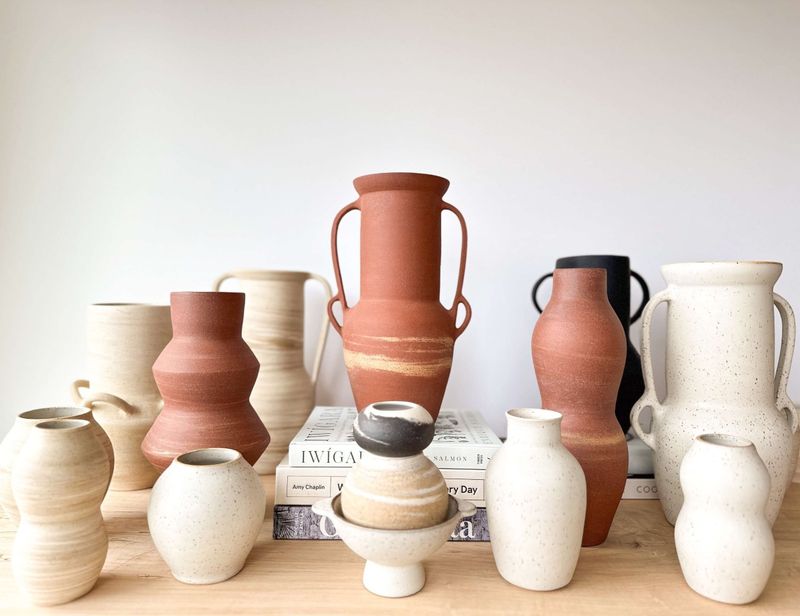 Textured Ceramic Vessels In Earth Tones