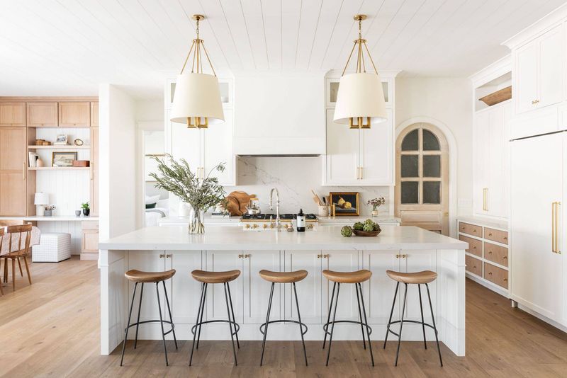 Utah Designers Say Goodbye To These 10 Kitchen Trends, And Hello To 11 Classics That Last - Decor Hint Statement Light Fixtures Illuminate With Lasting Style